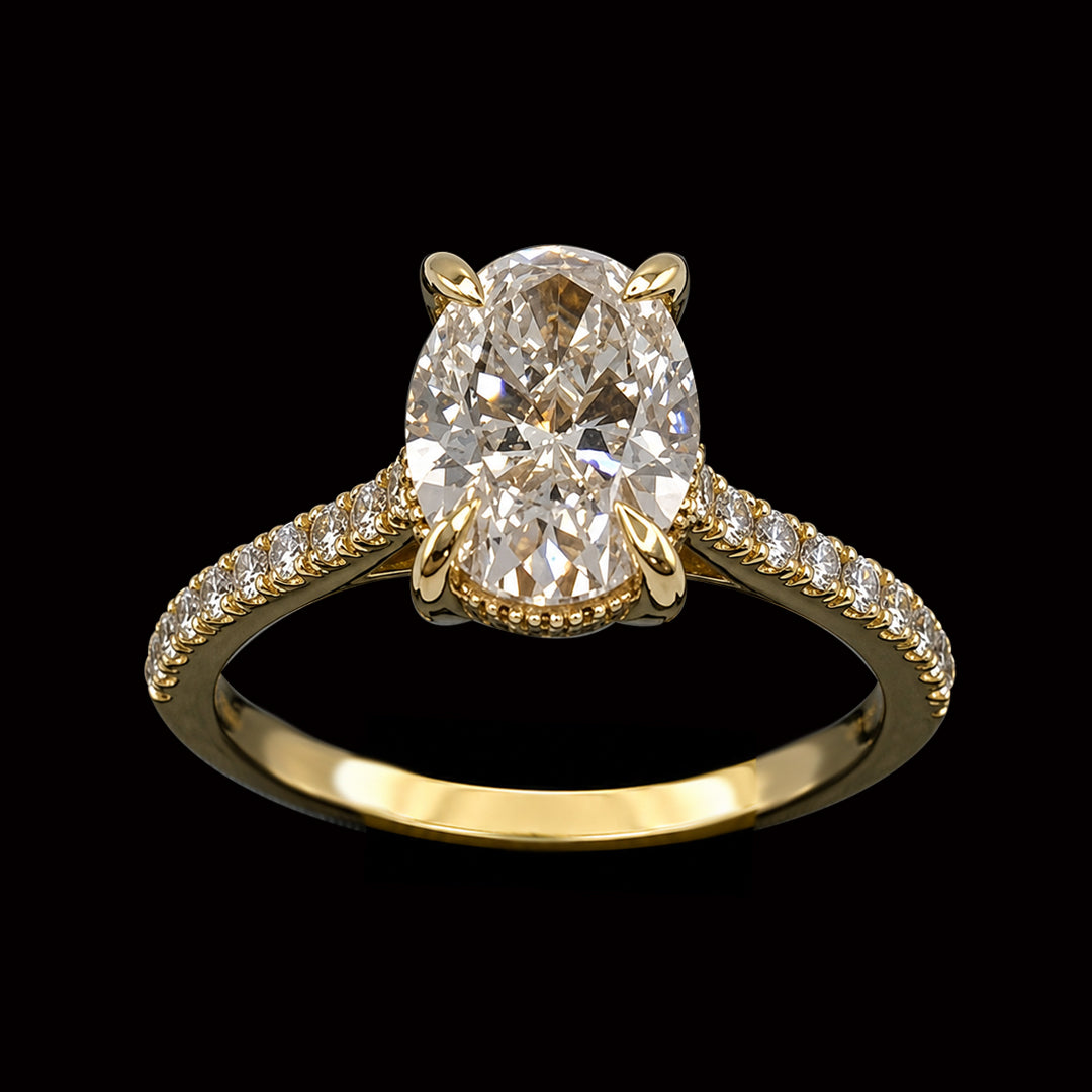 Oval Shaped Diamonds in Gold Ring
