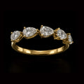 Pear Shaped Diamonds in Gold Ring
