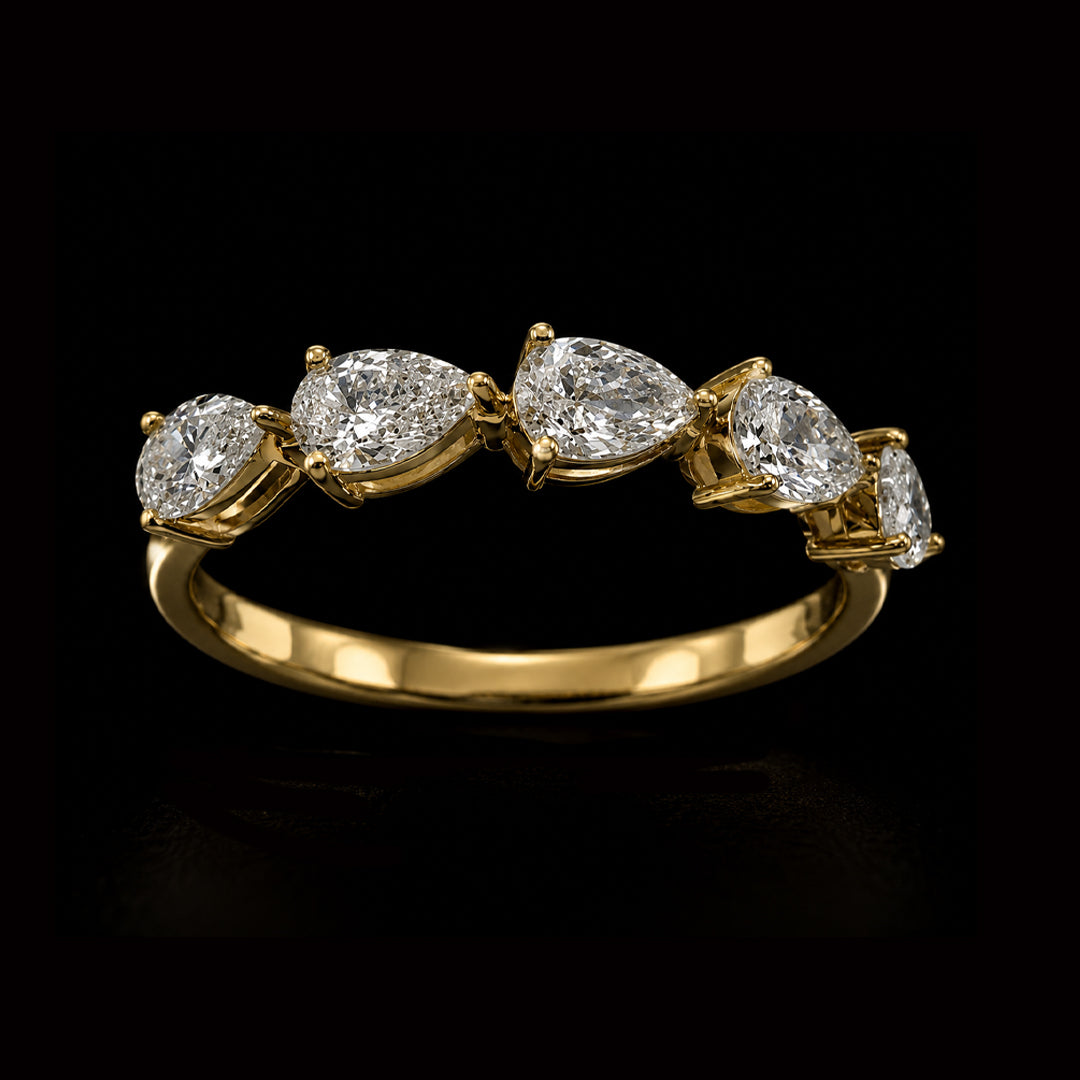 Pear Shaped Diamonds in Gold Ring
