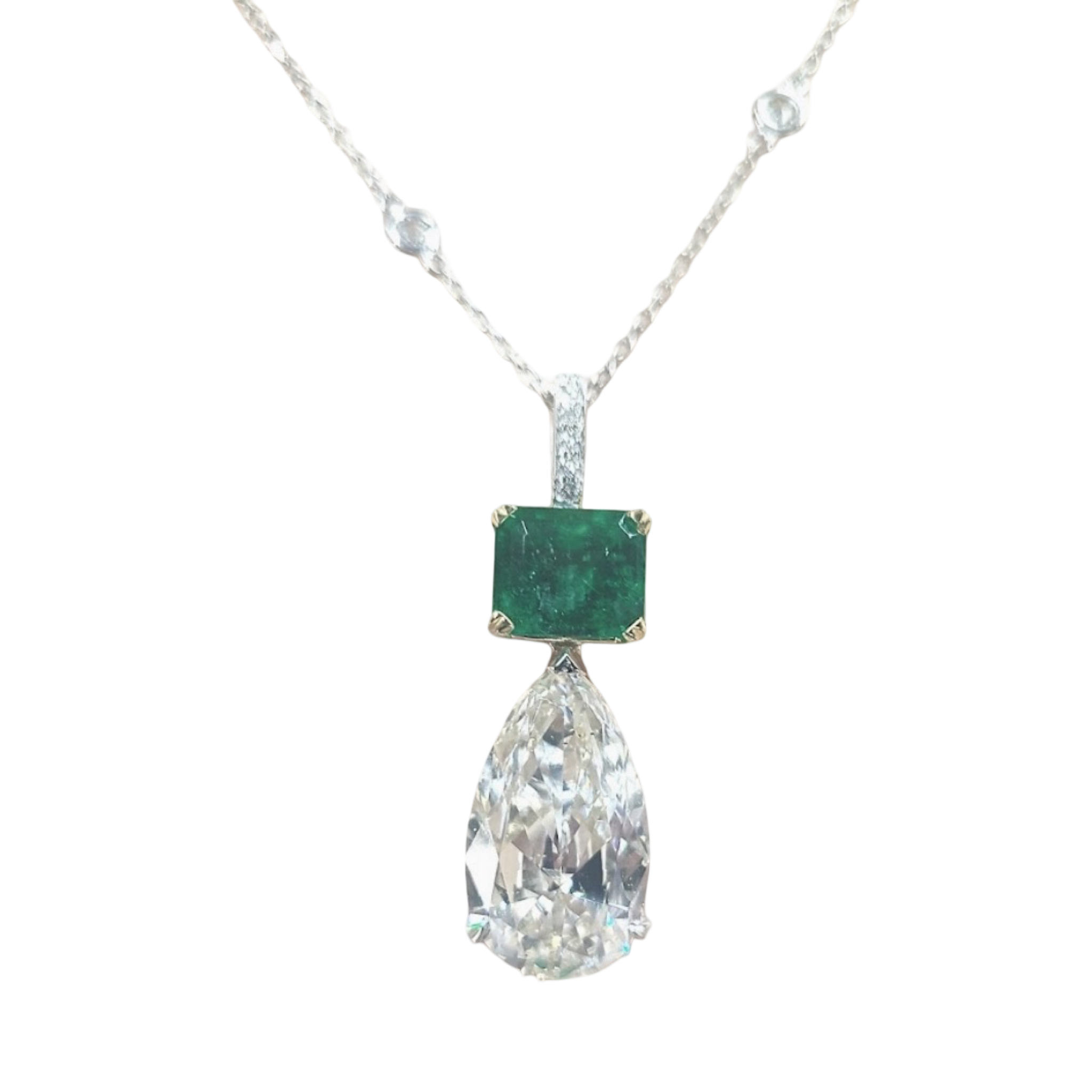 Emerald and diamond pendant