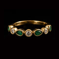 Gold Ring with Pear Shaped Emeralds and Round Diamonds