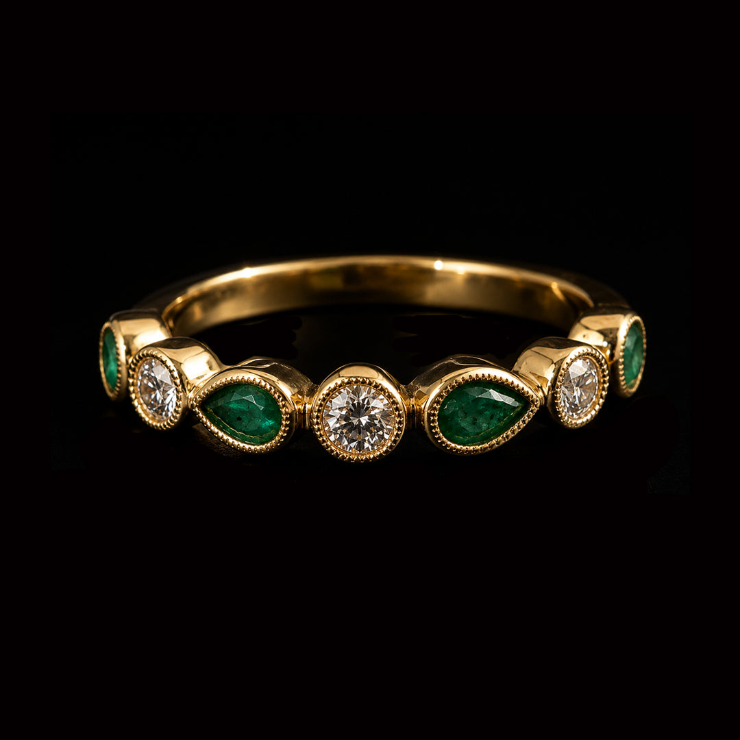 Gold Ring with Pear Shaped Emeralds and Round Diamonds