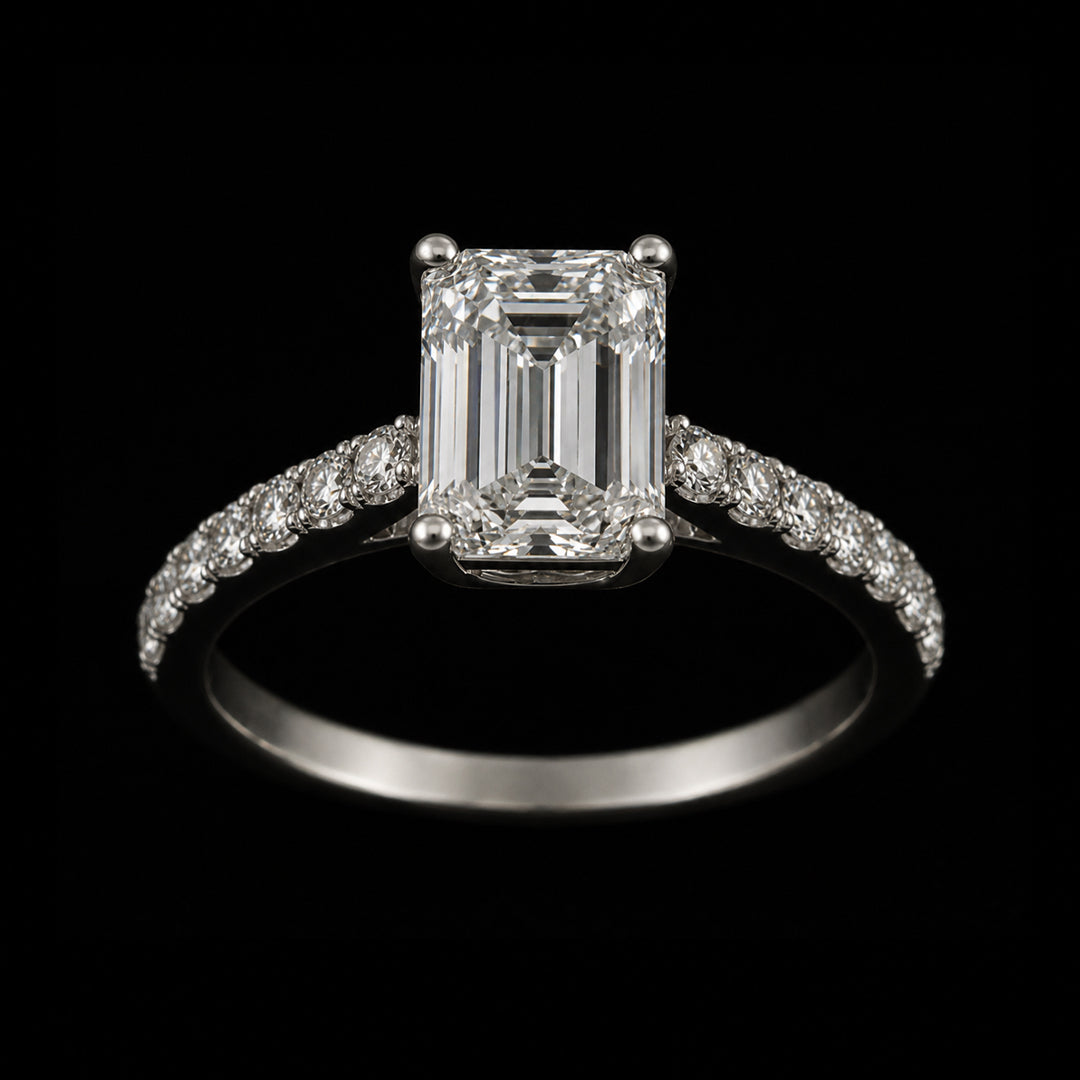 Emerald and Round Shaped Diamonds in Silver Ring