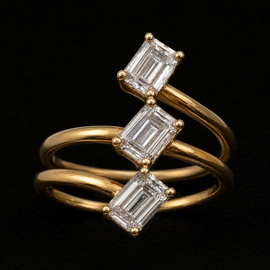 Emerald Shaped Diamonds in Triple Band Gold Ring
