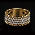 Gold ring with triple row of diamonds